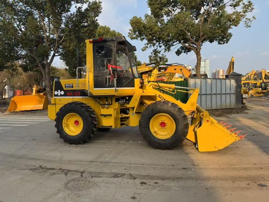 Originele Japan Gebruikte Komatsu WA100-1 Wielladers Werken In De Tuin